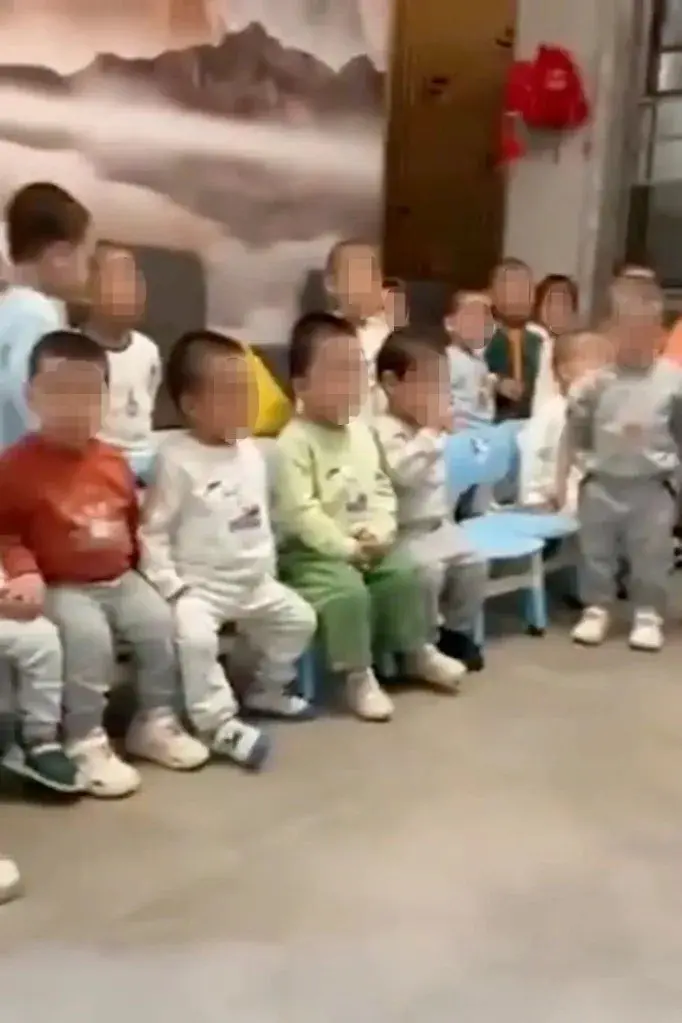 A video of dozens of little boys shouting, "Daddy!" was posted by social media accounts linked to Xu. SOURCE: YAHOO