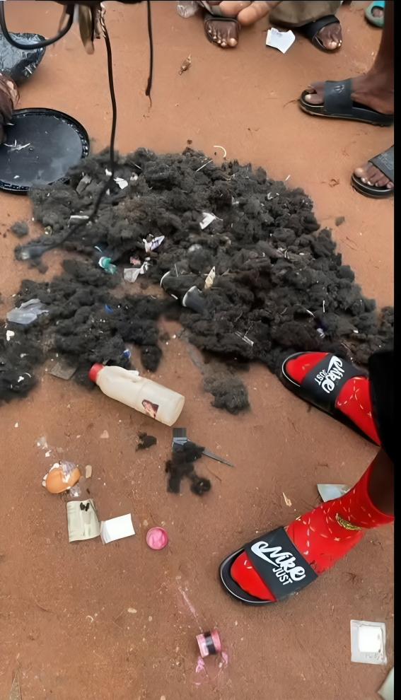 A large pile of human hair recovered by Abia State police officers inside the suspect's apartment.