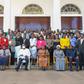 President Yoweri Museveni poses with the outgoing cabinet