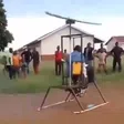 Hilarious reactions as man attempts to fly home-made helicopter (video)