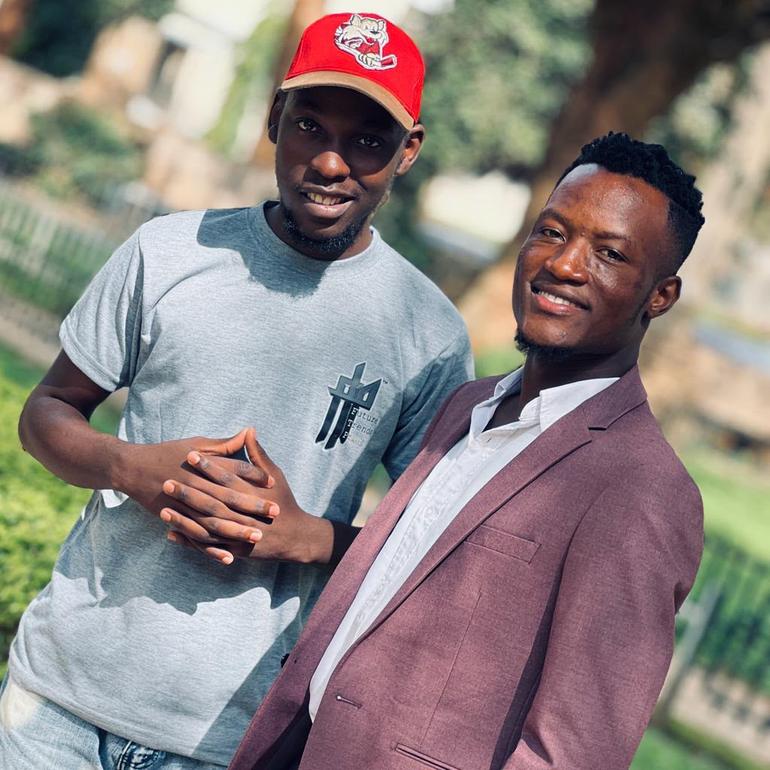 H.E Micah, whose real name is Brandon Kabonge, with fellow music video director Edrine Paul