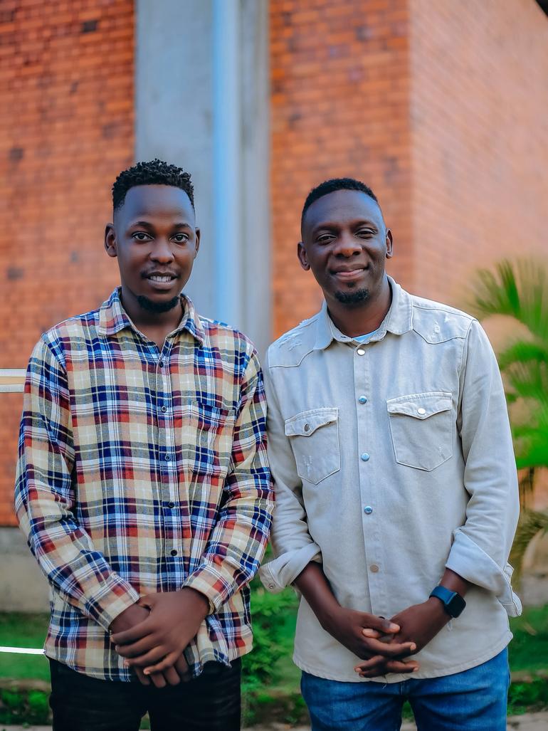 H.E Micah with Pastor Bugembe, who is also a musician