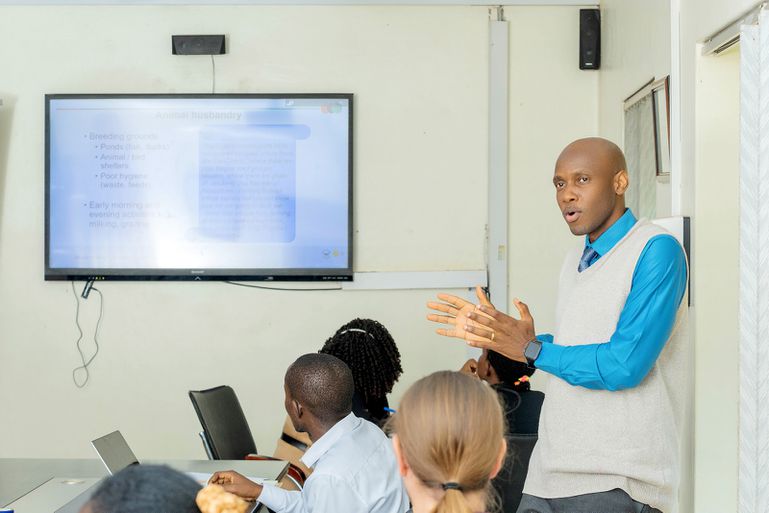 Assoc. Prof. David Musoke presents research findings on how livelihoods, including maize cultivation near homes, may influence malaria exposure during a stakeholder workshop at the Resilient Africa Network, Kololo, on April 15, 2026.