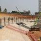 Government impressed by Hoima Stadium construction progress