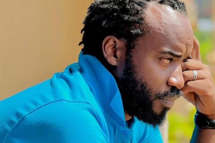 Tabz addresses speculation on release; unshaved dreadlocks