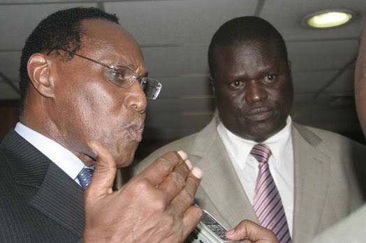 Then-Internal Security Minister George Saitoti and assistant minister, Orwa Ojode