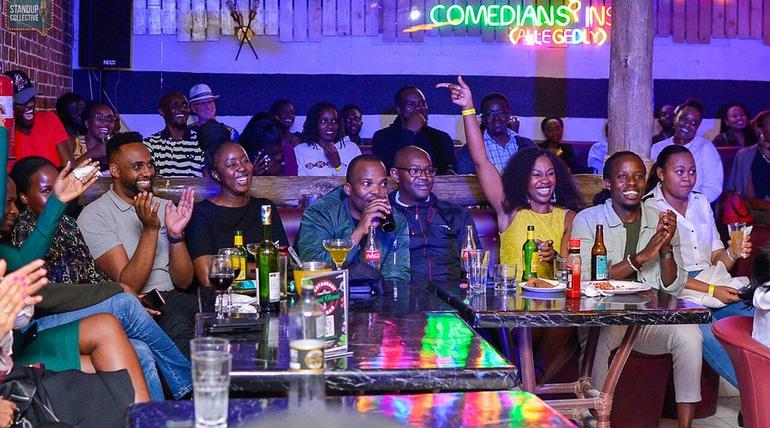 Popular comedian and event host MC Jesse hangs out with other revelers at a popular entertainment spot in Nairobi County (Image: Files)