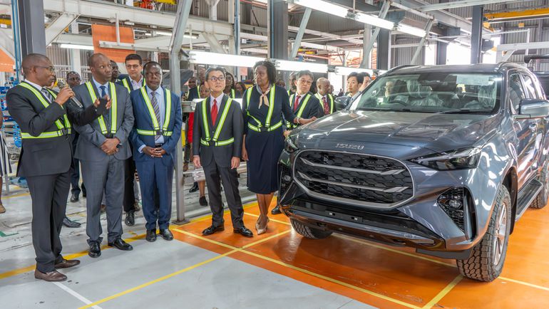 Trade CS  Lee Kinyajui together with Isuzu EA and the Japanese Ambassador to Kenya, raise a toast during the launch of the new mu-X.