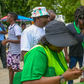 A Safaricom subscriber using her phone