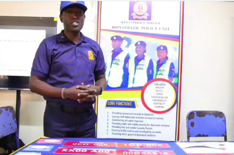 A Diplomatic Police Unit officer explaining details around red diplomatic number plates in Kenya. (Image: Kenya Police Service)
