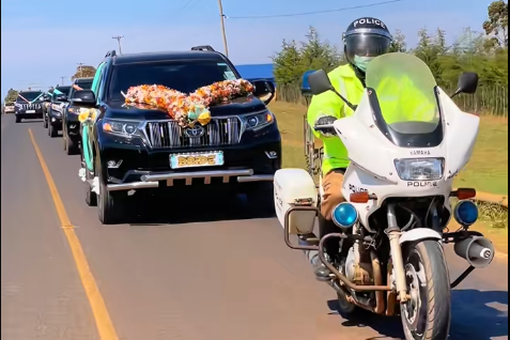 A police officer providing escort for a wedding
