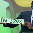 Transport Cabinet Secretary Davis Chirchir displays new green number plates for electric vehicles