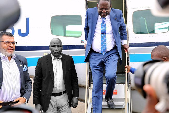 Raila Odinga and his late bodyguard, George Oduor