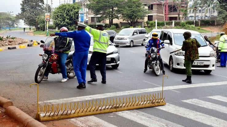 Traffic police officers divert traffic in Nairobi CBD during a recent public holiday (Image: Files)