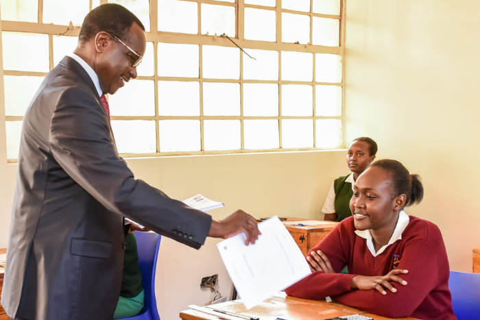 Education CS Julius Ogamba administering KCSE 2025 papers at Precious Blood Riruta