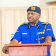Inspector General Douglas Kanja Kirocho addressing a press briefing on road safety measures during the December 2024 festive season, wearing a National Police Service uniform. He has deloyed NTSA, undercover officers, specialised units