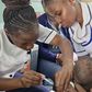 Nurses administering a vaccine