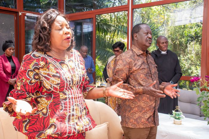 The late Raila Odinga and Ida Odinga during a past service