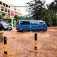 Past image: Vehicles wade through water in Nairobi, capital of Kenya, April 24, 2018