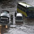 Vehicles partially submerged in floodwater following heavy rains in Nairobi, Kenya