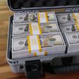 A briefcase with dollars