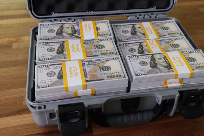 A briefcase with dollars
