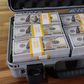 A briefcase with dollars
