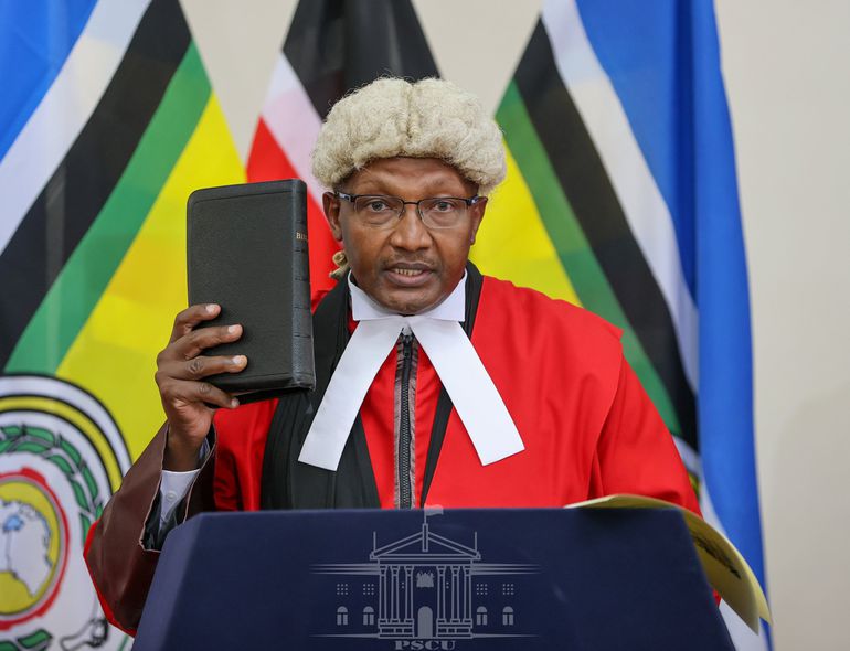 Feb 28, 2021: Justice Kathurima M'Inoti takes Oath of Office as Judge of the East African Court of Justice during the 21st Ordinary Summit of the EAC Heads of State