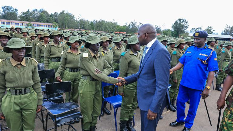 Interior CS Kipchumba Murkomen greeting Police recruits in Kiganjo training college