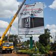 Shock as daring Nairobi man vandalises billboard in broad daylight