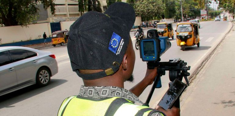 An NTSA staffer using a speed gun