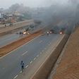 A blocked section of the Southern Bypass after unknown groups lit fires in the road