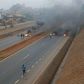 A blocked section of the Southern Bypass after unknown groups lit fires in the road