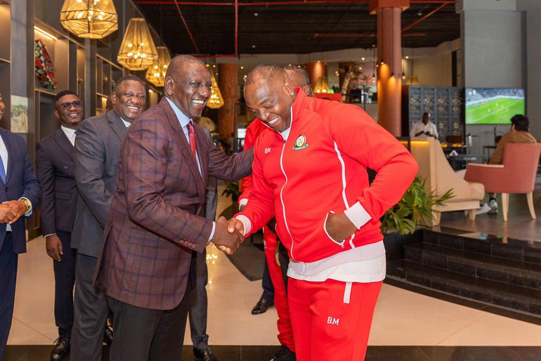 President William Ruto with Harambee Stars coach Benni McCarthy