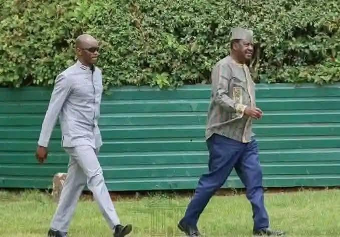 The late Raila Odinga with his longtime bodyguard Maurice Ogeta.