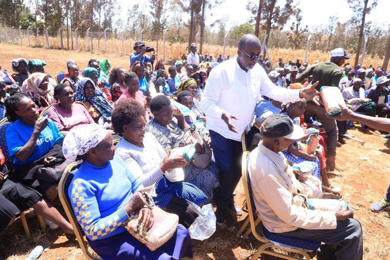 Former Agriculture CS and Meru gubernatorial aspirant Mithika Linturi interacts with Ruiri Rwarera residents during the launch of the certified seed program (Image: Files)