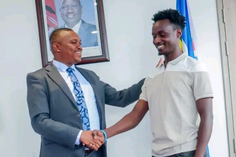 Skater Kevin Kiarie with Sports PS Elijah Mwangi