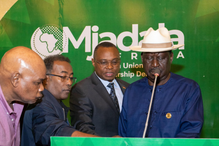 Raila with his team preparing for the AU debate