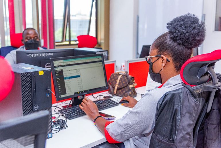 A KRA staff member working on a computer