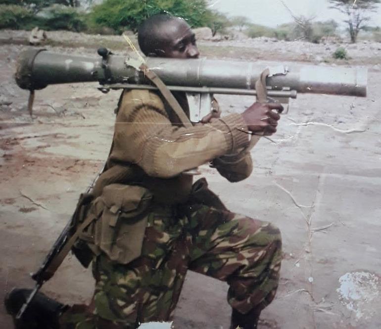 An undated image of veteran soldier Njenge Jeff posing with a mortar gun at a field session during their basic training in Nginyang, Baringo County (Image: Files)