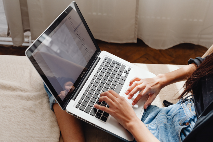 Illustration of a person using a laptop