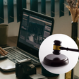 An illustration of a person using a laptop and a judge gavel (inset)