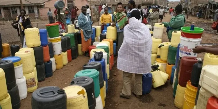 Residents queing to buy water from water vendors