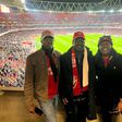 Former Prime Minister of the Republic of Kenya, The Late Raila Amolo Odinga (middle), poses with his children Raila Jr. (left) and Winnie Odinga (right) at the Emirates Stadium at a past Arsenal match