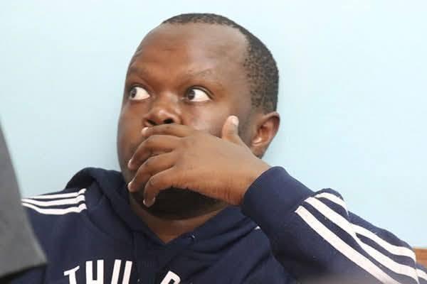 An undated image of ex-KDF major Peter Mugure attending a court session for the 2019 murders of his wife and two kids (Image: Files)