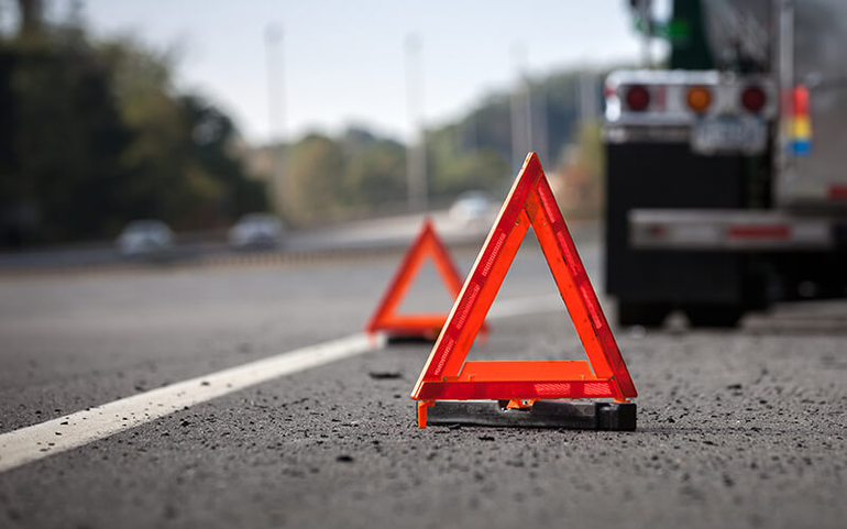 Warning triangles placed at the scene of a broken down vehicle