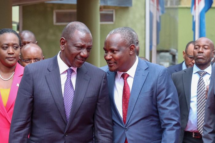 President William Ruto speaking with Treasury CS John Mbadi during a past function