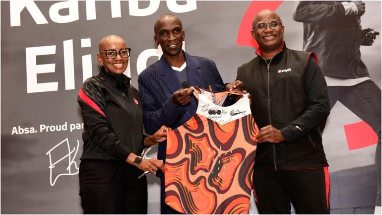Absa Bank Kenya Marketing & Corporate Affairs Director Mwihaki Wachira, marathoner Eliud Kipchoge with Absa Bank Kenya Personal & Private Banking Director Moses Muthui during the unveiling of a landmark partnership.