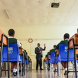 Education CS Julius Ogamba administering 2025 KCSE papers at Precious Blood Riruta Girls