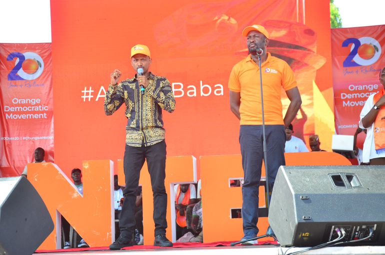 Babu Owino and Edwin Sifuna on the podium at the ODM@20 celebrations at Mama Ngina Water front Mombasa